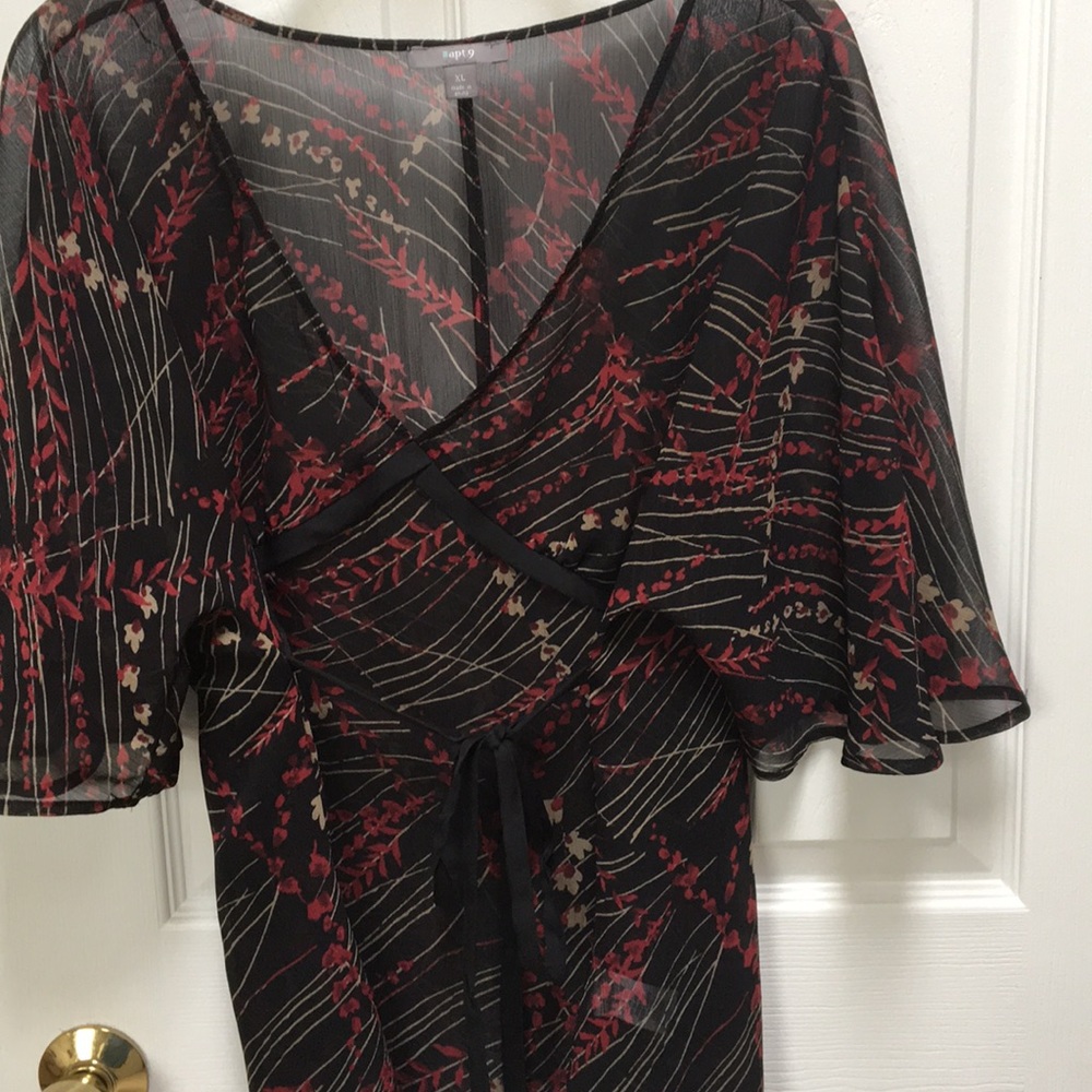 See through black shirt with floral pattern